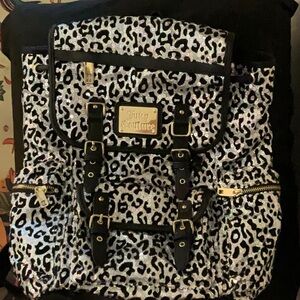 Juicy Couture Black and White Leopard Print Backpack with Buckle Straps